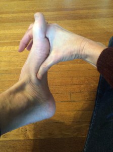 Using my thumb to massage my arch